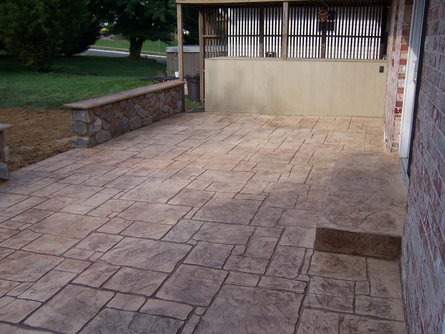 Finished stamped concrete patio completed by Interscope Contractors